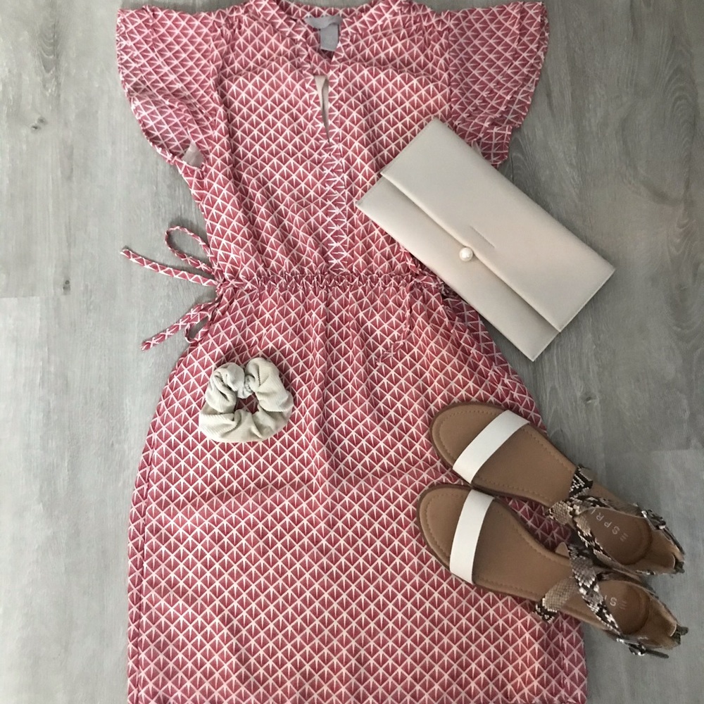 tan dress with a red pattern